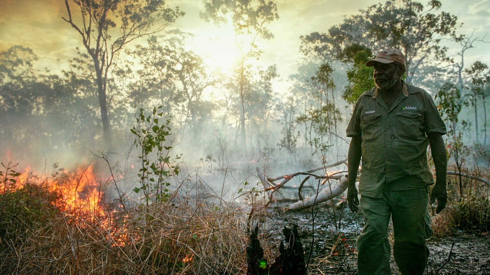 ASRAC ranger managing a cultural burn in Northern Territory bushland